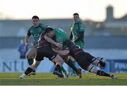 15 February 2014; Rodney Ah You, Connacht, is tackled by James Hilterbrand, left, and Roddy Grant, Edinburgh. Celtic League 2013/14, Round 14, Connacht v Edinburgh, Sportsground, Galway. Picture credit: Ramsey Cardy / SPORTSFILE