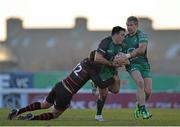 15 February 2014; Denis Buckley, offloads to team-mate Fionn Carr, Connacht, as he is tackled by Andries Strauss, Edinburgh. Celtic League 2013/14, Round 14, Connacht v Edinburgh, Sportsground, Galway. Picture credit: Ramsey Cardy / SPORTSFILE