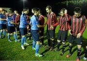 18 February 2014; The IT Carlow and University College Dublin players shake hands before the game. UMBRO CUFL Premier Division Final, IT Carlow v University College Dublin, Frank Cooke Park, Tolka Rovers FC, Dublin. Picture credit: Pat Murphy / SPORTSFILE