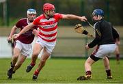 19 February 2014; Daniel Dooley, Cork Institute of Technology, in action against David Magner, left, and Kevin Flynn, N.U.I. Galway. Irish Daily Mail HE GAA Fitzgibbon Cup 2014, Quarter-Final, Cork Institute of Technology v N.U.I. Galway, Cork Institute of Technology, Bishopstown, Cork. Picture credit: Matt Browne / SPORTSFILE