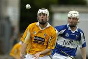 9 July 2005; Johnny Campbell, Antrim, in action against Tommy Fitzgerald, Laois. Guinness All-Ireland Senior Hurling Championship Qualifier, Round 3, Antrim v Laois, Casement Park, Belfast. Picture credit; Matt Browne / SPORTSFILE