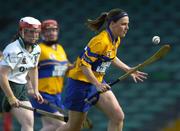 9 July 2005; Catherine O'Loughlin, Clare, in action against Catherine Hayes, Limerick. Munster Junior Camogie Championship Final, Limerick v Clare, Gaelic Grounds, Limerick. Picture credit; Damien Eagers / SPORTSFILE