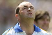 10 July 2005; Anthony Daly, Clare manager, looks to the heavens during the national anthem. Guinness All-Ireland Senior Hurling Championship Qualifier, Round 3, Clare v Waterford, Cusack Park, Ennis, Co. Clare. Picture credit; Damien Eagers / SPORTSFILE