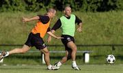 12 July 2005; Greg O'Halloran, right, in action against team-mate Derek Coughlan during squad training. Cork City squad training, Paneveyzs, Lithuania. Picture credit; Brian Lawless / SPORTSFILE