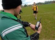 21 February 2014; Kieran Treanor, fourth official, tests the GAA's new clock / hooter system, which is being used for the first time this weekend, on a trial basis, in the Irish Daily Mail Sigerson Cup semi-finals and final hosted by Queen's University, Belfast. The Dub, Queen's University, Belfast, Co. Antrim. Picture credit: Oliver McVeigh / SPORTSFILE