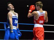 21 February 2014; Joe Fitzpatrick, right, Immaculata boxing club, exchanges punches with James McDowell, Univerisity boxing club Limerick, during their 60kg bout. National Senior Boxing Championships, First Round, National Stadium, Dublin. Picture credit: David Maher / SPORTSFILE