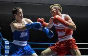 21 February 2014; Declan Geraghty, right, Crumlin boxing club, exchanges punches with Francis Campbell, Crumlin boxing club, during their 60kg bout. National Senior Boxing Championships, First Round, National Stadium, Dublin. Picture credit: David Maher / SPORTSFILE