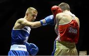 22 February 2014; Kurt Walker, left, Canal Boxing Club, exchanges punches with Carl McDonald, Golden Cobra Boxing Club, during their 56kg bout. National Senior Boxing Championships, First Round, National Stadium, Dublin. Picture credit: Barry Cregg / SPORTSFILE