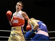 22 February 2014; Carl McDonald, left, Golden Cobra Boxing Club, exchanges punches with Kurt Walker, Canal Boxing Club, during their 56kg bout. National Senior Boxing Championships, First Round, National Stadium, Dublin. Picture credit: Barry Cregg / SPORTSFILE