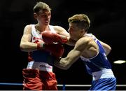 22 February 2014; Sean McComb, left, Holy Trinity Boxing Club, exchanges punches with Declan Geraghty, Crumlin Boxing Club, during their 60kg bout. National Senior Boxing Championships, First Round, National Stadium, Dublin. Picture credit: Barry Cregg / SPORTSFILE