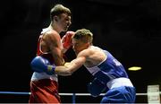 22 February 2014; Declan Geraghty, right, Crumlin Boxing Club, exchanges punches with Sean McComb, Holy Trinity Boxing Club, during their 60kg bout. National Senior Boxing Championships, First Round, National Stadium, Dublin. Picture credit: Barry Cregg / SPORTSFILE