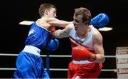 22 February 2014; Danny Coughlan, right, St.Annes Boxing Club, exchanges punches with Keith Flavin, Paulstown Boxing Club, during their 60kg bout. National Senior Boxing Championships, First Round, National Stadium, Dublin. Picture credit: Barry Cregg / SPORTSFILE