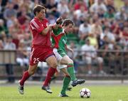 14 July 2005; Joe Gamble, Cork City, in action against Mindaugas Gargzijauskas, FK Ekranas. UEFA Cup, First Qualifying Round, First Leg, FK Ekranas v Cork City, Aukstaitija, Panevezys, Lithuania. Picture credit; Brian Lawless / SPORTSFILE