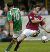 17 July 2005; George O'Callaghan, Cork City, beats Malcolm Stuart, Drogheda United to score his sides first goal. eircom League, Premier Division, Drogheda United v Cork City, United Park, Drogheda, Co. Louth. Picture credit; David Maher / SPORTSFILE