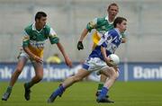 17 July 2005; Ciaran Delaney, Laois, in action against Pauric Duffy, left, and John Knight, Offaly. Leinster Minor Football Championship Final, Offaly v Laois, Croke Park, Dublin. Picture credit; Brian Lawless / SPORTSFILE