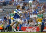 17 July 2005; Stephen O'Leary, Laois, is tackled by Diarmuid Horan, Offaly. Leinster Minor Football Championship Final, Offaly v Laois, Croke Park, Dublin. Picture credit; Brendan Moran / SPORTSFILE