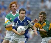 17 July 2005; Ciaran Delaney, Laois, in action against Diarmuid Horan, left, and Dean Bracken, Offaly. Leinster Minor Football Championship Final, Offaly v Laois, Croke Park, Dublin. Picture credit; Brendan Moran / SPORTSFILE