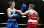 22 February 2014; Keith Flavin, left, Paulstown Boxing Club, exchanges punches with Danny Coughlan, St.Annes Boxing Club, during their 60kg bout. National Senior Boxing Championships, First Round, National Stadium, Dublin. Picture credit: Barry Cregg / SPORTSFILE