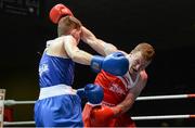 22 February 2014; Kevin Fennessy, right, Clonmel Boxing Club, exchanges punches with George Bates, St.Mary's Boxing Club, during their 60kg bout. National Senior Boxing Championships, First Round, National Stadium, Dublin. Picture credit: Barry Cregg / SPORTSFILE