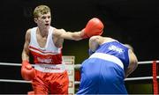 22 February 2014; Joe Fitzpatrick, left, Immaculata Boxing Club, exchanges punches with David Oliver Joyce, St. Michaels Boxing Club, during their 60kg bout. National Senior Boxing Championships, First Round, National Stadium, Dublin. Picture credit: Barry Cregg / SPORTSFILE