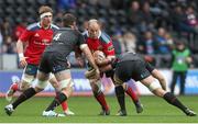 23 February 2014; BJ Botha, Munster, is tackled by Perry Parker and Joe Bearman, Ospreys. Celtic League 2013/14 Round 15, Ospreys v Munster, Liberty Stadium, Swansea, Wales. Picture credit: Steve Pope / SPORTSFILE