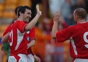 20 July 2005; Jason Byrne, Shelbourne, celebrates with team-mate Glen Crowe, right, after scoring his sides second goal. UEFA Champions League, First Qualifying Round, Second Leg, Shelbourne v Glentoran, Tolka Park, Dublin. Picture credit; David Maher / SPORTSFILE