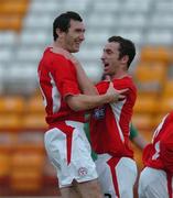 20 July 2005; Jason Byrne, Shelbourne, celebrates with team-mate Ollie Cahill, right, after scoring his sides second goal. UEFA Champions League, First Qualifying Round, Second Leg, Shelbourne v Glentoran, Tolka Park, Dublin. Picture credit; David Maher / SPORTSFILE