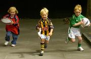 19 July 2005;  At the announcement that Ireland's 8th National Coaching Forum, which is coordinated by the National Coaching and Training Centre (NCTC), in association with Lucozade Sport, will take place in Limerick from 2-4 September are, Hannah Walsh, age 3, from Swords, John Mitchell, right, age 6, from Dunboyne, Co. Meath, and Jack Ryan, age 3, from Inistioge, Kilkenny. Kildare Street, Dublin. Picture credit; Ciara Lyster / SPORTSFILE