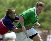 10 June 2000; Malcolm O'Kelly, Ireland, is tackled by Don Younger, USA. International Rugby Friendly, USA v Ireland, Singer Family Park Rugby Ground, Manchester, New Hampshire, United States of America. Picture credit: Matt Browne / SPORTSFILE