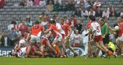 23 July 2005; Tyrone's Peter Canavan (13) is involved in a melee with players from both sides which resulted in Canavan being shown a red card by referee Michael Collins. Bank of Ireland Ulster Senior Football Championship Final Replay, Tyrone v Armagh, Croke Park, Dublin. Picture credit; Brendan Moran / SPORTSFILE