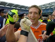 23 July 2005; Armagh captain Kieran McGeeney celebrates after the final whistle. Bank of Ireland Ulster Senior Football Championship Final Replay, Tyrone v Armagh, Croke Park, Dublin. Picture credit; Brendan Moran / SPORTSFILE