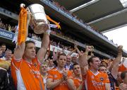 23 July 2005; Armagh captain Kieran McGeeney lifts the Anglo Celt Cup. Bank of Ireland Ulster Senior Football Championship Final Replay, Tyrone v Armagh, Croke Park, Dublin. Picture credit; Damien Eagers / SPORTSFILE