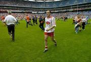 23 July 2005; Dejected Tyrone captain Brian Dooher leaves the pitch after the final whistle. Bank of Ireland Ulster Senior Football Championship Final Replay, Tyrone v Armagh, Croke Park, Dublin. Picture credit; Brendan Moran / SPORTSFILE