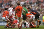 23 July 2005; Kieran McGeeney, (6), Armagh captain looks on as a melee breaks out which resulted in Tyrone's Peter Canavan being sent off. Bank of Ireland Ulster Senior Football Championship Final Replay, Tyrone v Armagh, Croke Park, Dublin. Picture credit; Damien Eagers / SPORTSFILE