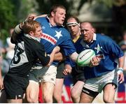 13 May 2000; Malcolm O'Kelly, St Mary's, passes the ball off to a team-mate despite the tackle by Shane Stewart, Ballymena. AIB All-Ireland League semi-final, St Mary's v Ballymena, Templeville Road, Dublin. Picture credit: Matt Browne / SPORTSFILE