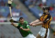 31 July 2005; Peter Barry, Kilkenny, is tackled by Donie Ryan, Limerick. Guinness All-Ireland Senior Hurling Championship Quarter-Final, Kilkenny v Limerick, Croke Park, Dublin. Picture credit; Ray McManus / SPORTSFILE