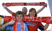 2 August 2005; Shelbourne supporters Paul Wilson, age 12, with his parents John and Anne, in Bucharest for Shelbourne's UEFA Champions League, second qualifying round, second leg tie. Bucharest, Romania. Picture credit; Brian Lawless / SPORTSFILE