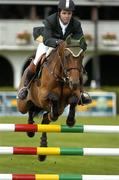 3 August 2005; Cian O'Connor, Ireland, aboard ABC Landliebe, in action during the Speed Stakes Qualifying round. Failte Ireland Dublin Horse Show, RDS, Ballsbridge, Dublin. Picture credit; Pat Murphy / SPORTSFILE