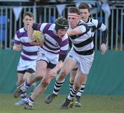 26 February 2014; Matthew Martin, Clongowes, is tackled by Max Kearney, Belvedere. Beauchamps Leinster Schools Junior Cup, Quarter-Final, Clongowes v Belvedere, Donnybrook Stadium, Donnybrook, Dublin. Picture credit: Matt Browne / SPORTSFILE