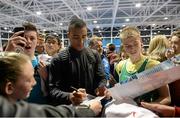 26 February 2014; Ashton Eaton signs autographs following the AIT International Arena Grand Prix. Athlone Institute of Technology International Arena, Athlone, Co. Westmeath. Picture credit: Stephen McCarthy / SPORTSFILE