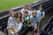 2 August 2005; The All-Ireland Minor A & B Camogie Finals, Kilkenny v Tipperary and Offaly v Armagh, will take place in Parnell Park, Dublin, on Sunday 7th August 2005. Pictured at a photocall to introduce the captains are Marcella Maloney, Offaly, and camogie stars of the future, l to r, Zoe Murray, Moya Caulfield, Aoife Nic Con Iomaire, Emily Lacey, Meadhbh Ní Dhálaigh, Clara O’Sullivan and  Leah Divine, who were on hand to launch “Camogie is Cúl” wristbands which are being distributed through Camogie and Hurling camps. Croke Park, Dublin. Picture credit; Ray McManus / SPORTSFILE