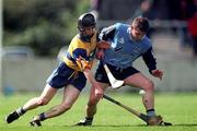 18 April 1999; Brian Minogue of Clare in action against Sean Duignan of Dublin during the Church and General National Hurling League Division 1A match between Dublin and Clare at Parnell Park in Dublin. Photo by Damien Eagers/Sportsfile