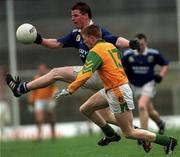 11 April 1999; Eamon Breen of Kerry in action against Ray Magee of Meath during the Church & General National Football League Division 1 Quarter-Final match between Kerry and Meath at the Gaelic Grounds in Limerick. Photo by Brendan Moran/Sportsfile