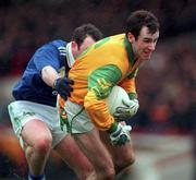 11 April 1999; Hank Traynor of Meath in action against Seamus Moynihan of Kerry during the Church & General National Football League Division 1 Quarter-Final match between Kerry and Meath at the Gaelic Grounds in Limerick. Photo by Brendan Moran/Sportsfile