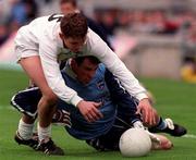 11 April 1999; Padraig Graven of Kildare in action against Paddy Christie of Dublin during the Church and General National Football League Quarter-Final match between Dublin and Kildare at Croke Park in Dublin. Photo by Damien Eagers/Sportsfile