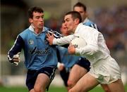 11 April 1999; Padraig Brennan of Kildare in action against Paddy Christie of Dublin during the Church and General National Football League Quarter-Final match between Dublin and Kildare at Croke Park in Dublin. Photo by Damien Eagers/Sportsfile