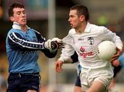 11 April 1999; Padraig Brennan of Kildare in action against Paddy Christie of Dublin during the Church and General National Football League Quarter-Final match between Dublin and Kildare at Croke Park in Dublin. Photo by Damien Eagers/Sportsfile