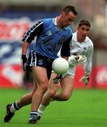 11 April 1999; Paul Curran of Dublin in action against Anthony Rainbow of Kidlare during the Church and General National Football League Quarter-Final match between Dublin and Kildare at Croke Park in Dublin. Photo by Ray McManus/Sportsfile