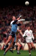 11 April 1999; Declan Kerrigan of Kildare in action against Paul Curran of Dublin during the Church and General National Football League Quarter-Final match between Dublin and Kildare at Croke Park in Dublin. Photo by Ray McManus/Sportsfile