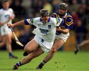 18 April 1999; Paul Flynn of Waterford in action against Donncha Fahy of Tipperary during the Church and General National Hurling League Division 1B match between Tipperary and Waterford at Semple Stadium in Thurles, Tipperary. Photo by Brendan Moran/Sportsfile